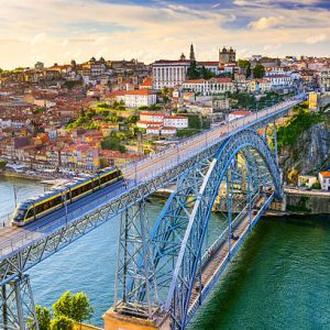 Porto, Portugal cityscape on the Douro River and Dom Luis I Bridge.
